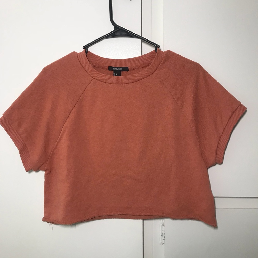 Orange crop top.